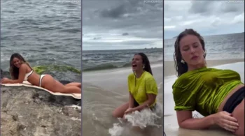 Paolla Oliveira flagrada na praia usando uma roupa com transparência