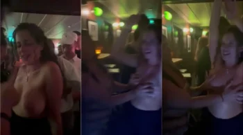 Mulher linda mostrando um decote generoso na balada